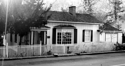 [ B&W photo of house wide. ]